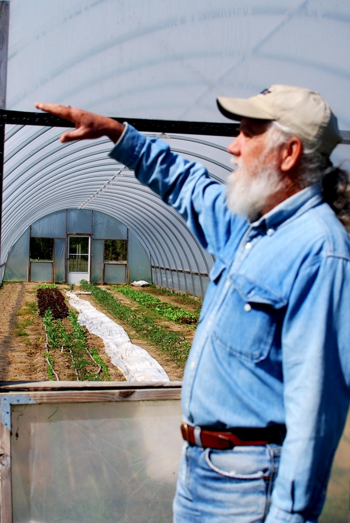 Charlie shows us one of his greenhouses.  