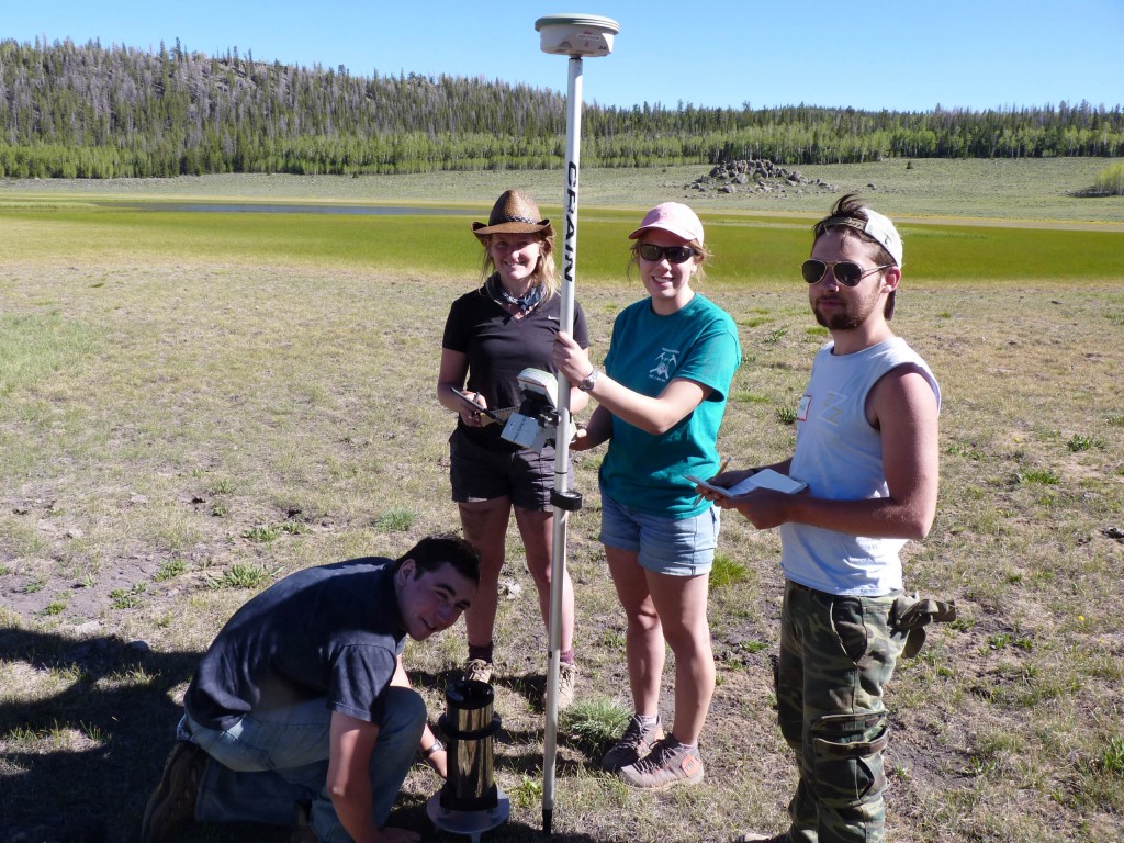 The Wayne WonderMonkeys making a gravity and elevation measurement near Fish Lake. From left to right Zack Fleming (with the gravimeter), Erika Wenrich, Hanna Bartram (holding the kinematic GPS rover), and Peter Steele.