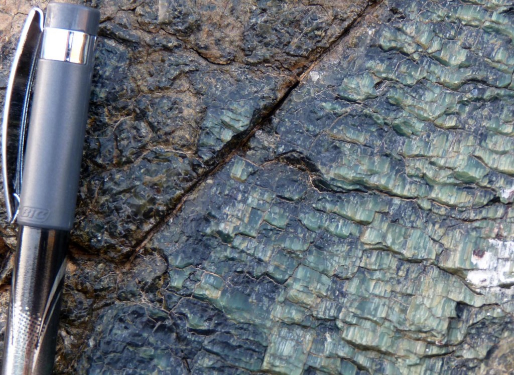 Slickensides on serpentinite coated fault, Oman ophiolite.