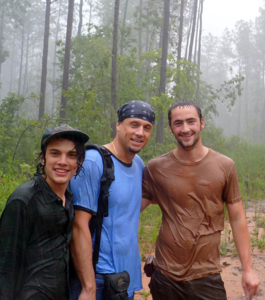 The Gentlemen of Science and Leisure, from left to right- Zachary Foster-Baril, Billy Jaeger, and Jacob Rosenthal in a downpour near Midway Mills.