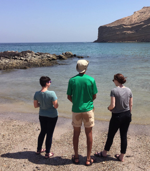 Lauren Visokay ('18), Moussa Dia ('18), and Cece Hurtado ('17) enjoying the beach at Qantab, Oman.
