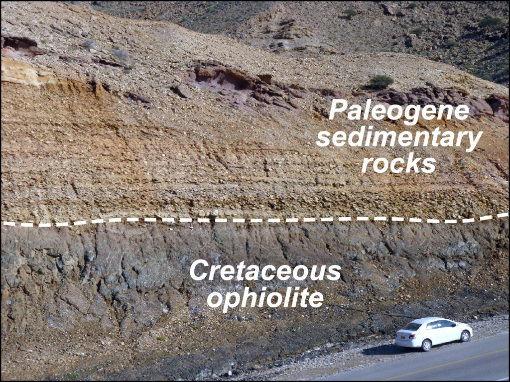 Unconformable contact between the Cretaceous ophiolite and overlying Paleogene strata exposed in roadcut to the south of Qantab. The Paleogene conglomerates contain clasts of the ophiolite. 