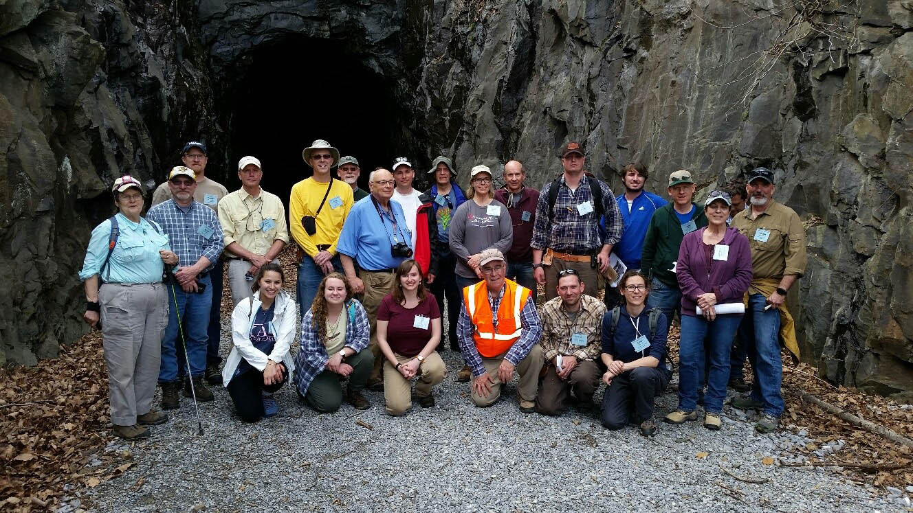 The From Laurentia to Iapetus field trip holding court at the southeastern portal of the Blue Ridge tunnel. This 1.3 km-long tunnel was constructed in the 1850s, and at the time was America’s longest tunnel. It was carved through deformed greenstone of the Neoproterozoic Catoctin Formation. How many trains chugged through this scene during the 86 years that the tunnel served as a conveyance (from 1858 to 1944)?