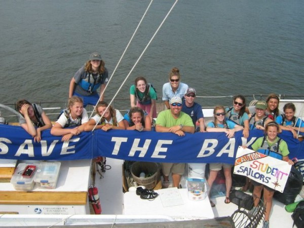 When I was 16, I spent my summer living on a 100 year old skipjack to work on watershed restoration projects with the Chesapeake Bay Foundation. I'm on the right wearing a green hat.