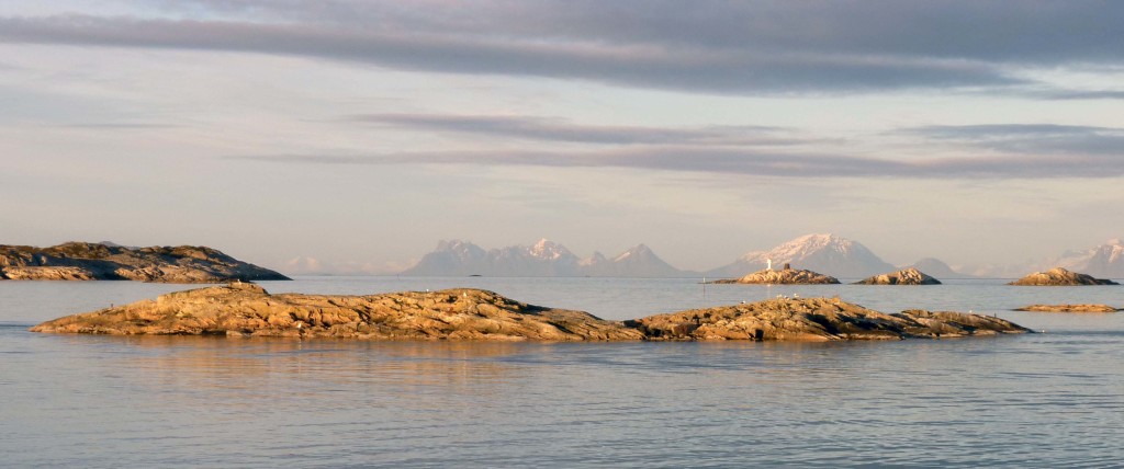 Skerries, just offshore from Henningsvær, in the late evening Arctic sunlight. 