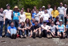 The 2012 Earth Structure & Dynamics class basks in sunshine on an outcrop of the Rockfish meta-conglomerate.