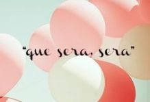 a card that has balloons and reads "que sera, sera"