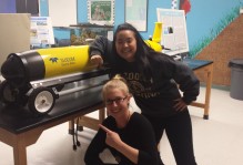 McCluskey and Hong point to an autonomous underwater gliding vehicle used during January’s lab on gliders.