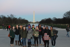 DC students pose in front of the Washington memorial