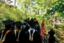 graduating class walking over the crim dell