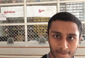 another selfie in front of a pharmacy
