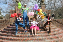 students dressed as Mario characters on the steps of the sunken garden