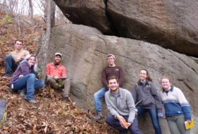 The Up-and-Away team, part of the 2017 Geological Field Methods course, on a steep Blue Ridge slope in front of a spectacular outcrop of meta-conglomerate and meta-arkose. These rocks are part of the Edicaran Swift Run Formation.