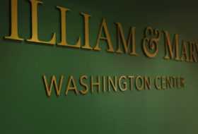 William & Mary Washington Center gold lettering on a green wall