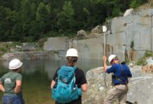 W&M geologist George Denny with a portable magnetometer at a dimension stone quarry in central Virginia.