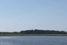 Nayses Bay, Virginia. Note osprey in mid-flight.