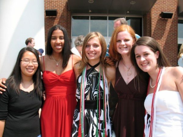 Five women celebrating high school graduation
