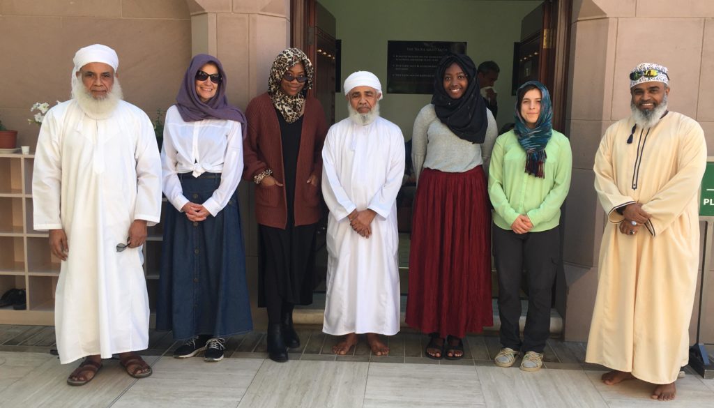 Several students and teachers posing at the Islamic Learning Center.