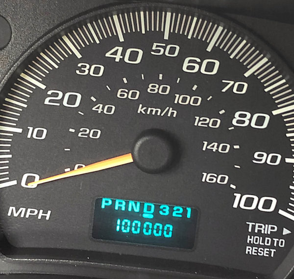 Odometer reading at 100,00 miles