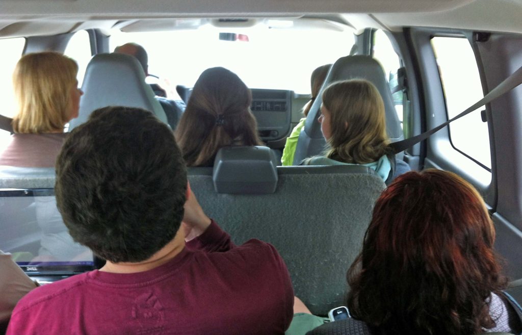 View of passengers in van.